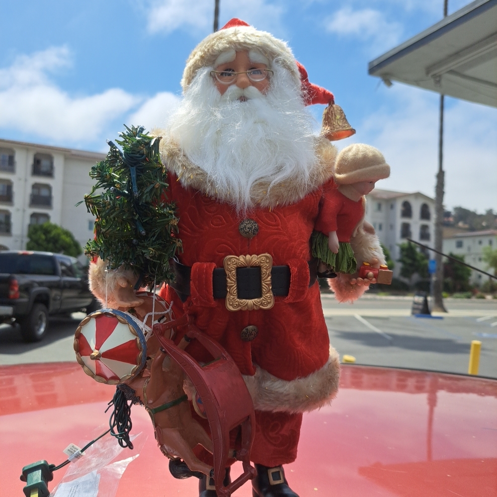 Festive Santa Claus Holiday Figurine in Red